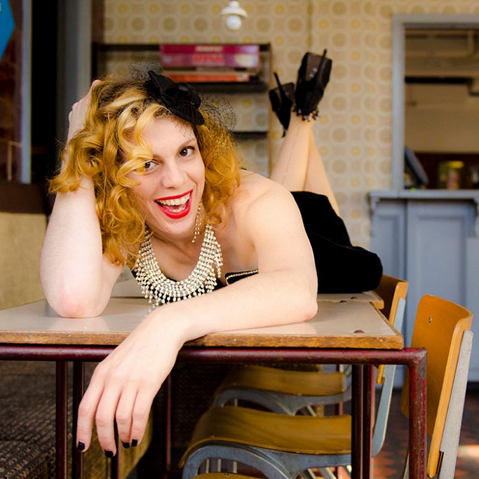 This cute black satin fascinator was used in a promotional shoot for Falbala Tights